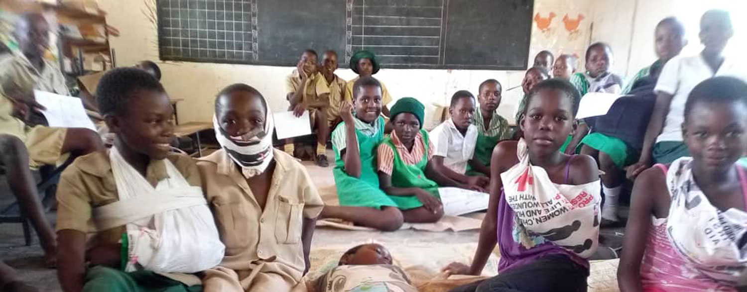 African children undertaking First Aid training