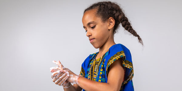 African child washing hands